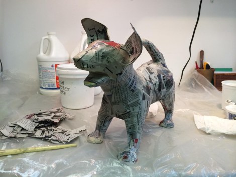Her's where I'm up to with the puppy. He's ready for some eyes, and a thin, smooth coat of paper pulp in which I'll make fur textures. I think he'll be a Dalmatian. 